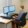 Ergotron WorkFit-TL desktop workstation placed on a desk.