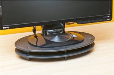 A close-up of the VuRyser 8800 monitor stand with a flat-screen monitor sitting on top of it.