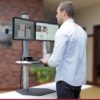 The Winston Sit Stand Workstation in its highest position, allowing the user to stand and work comfortably.