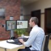 The Winston Sit Stand Workstation in its lowest position, providing a comfortable sitting position for the user.