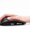 Side view of Handshoe Mouse, highlighting its curved shape and comfortable grip.